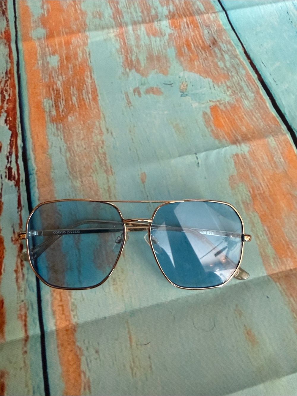 Gold Frame Sunglasses with Blue Lenses